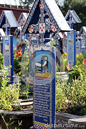 The Merry Cemetery is a cemetery in the village of SÄƒpÃ¢nÈ›a, MaramureÅŸ county, Romania. Editorial Stock Photo